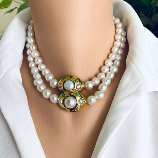 White pearl necklace with gold accent featuring double strands of freshwater pearls and a decorative gold focal accent.