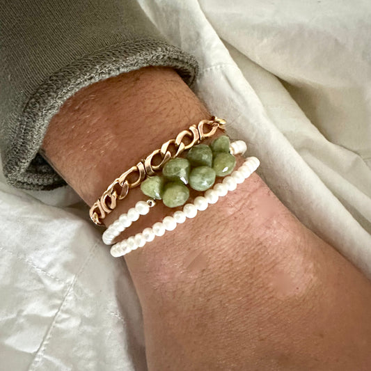 Double wrap pearl bracelet with olive green Vesuvianite, showcasing creamy pearls and earthy green tones.