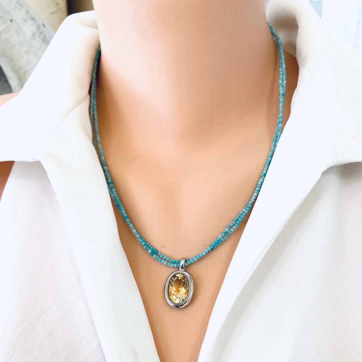 Blue Amazonite Citrine Pendant Necklace featuring a yellow citrine pendant on a double strand design.