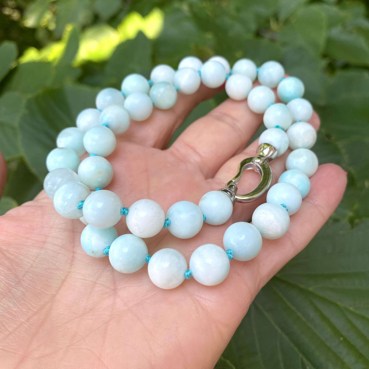 Light blue hemimorphite candy necklace close-up showing smooth AAA+ hemimorphite beads
