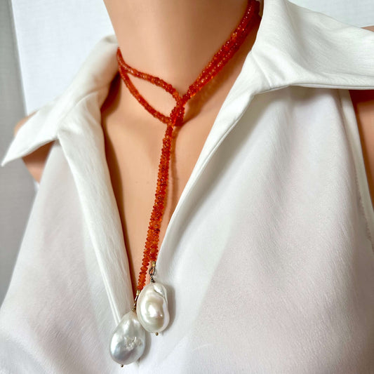 orange beaded lariat-wrap style necklace with two large baroque pearls,