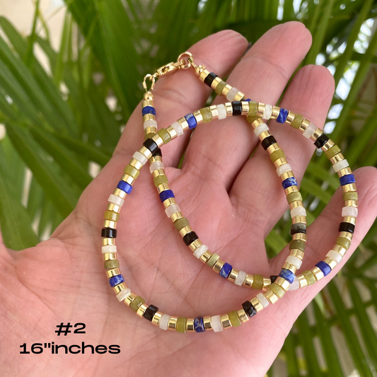 Gemstone choker necklace featuring multi-color beads and hematite, perfect for everyday style. Length: 16 inches.