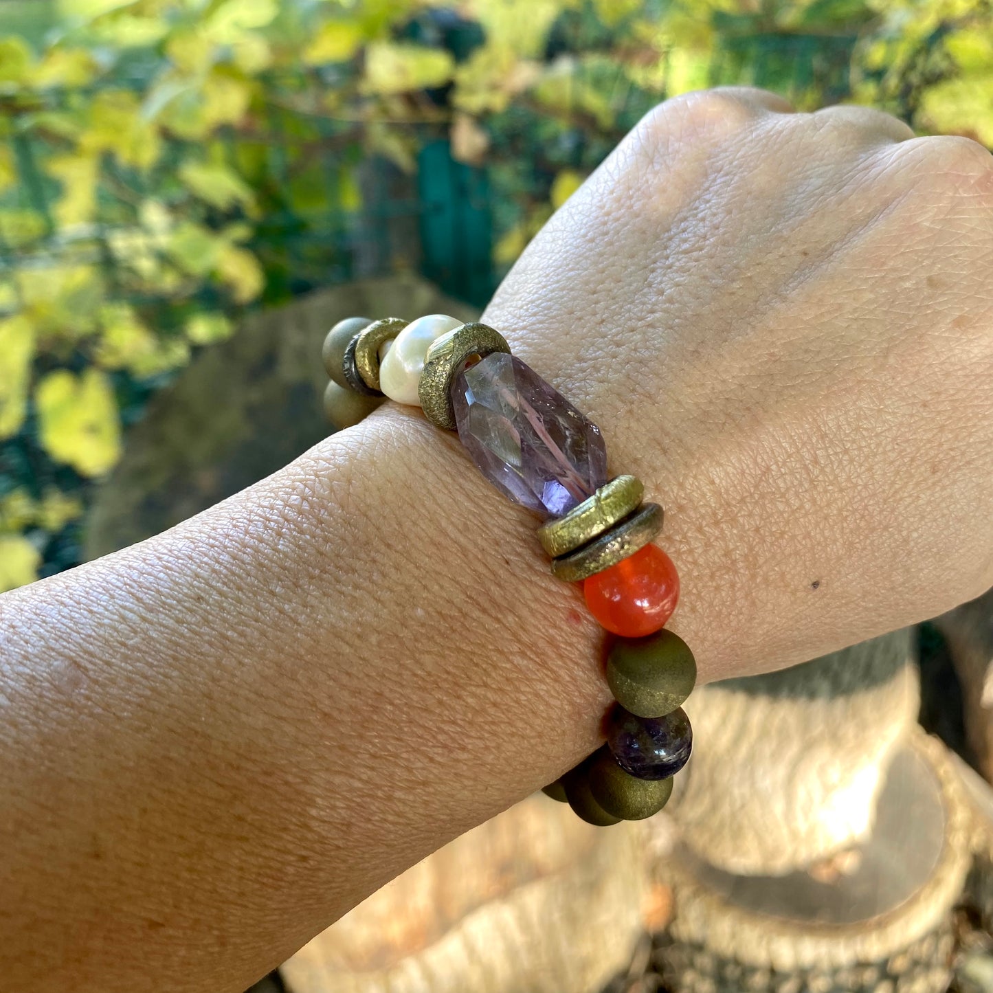 Amethyst baroque pearl bracelet worn on wrist, handmade in Canada with February birthstone amethyst