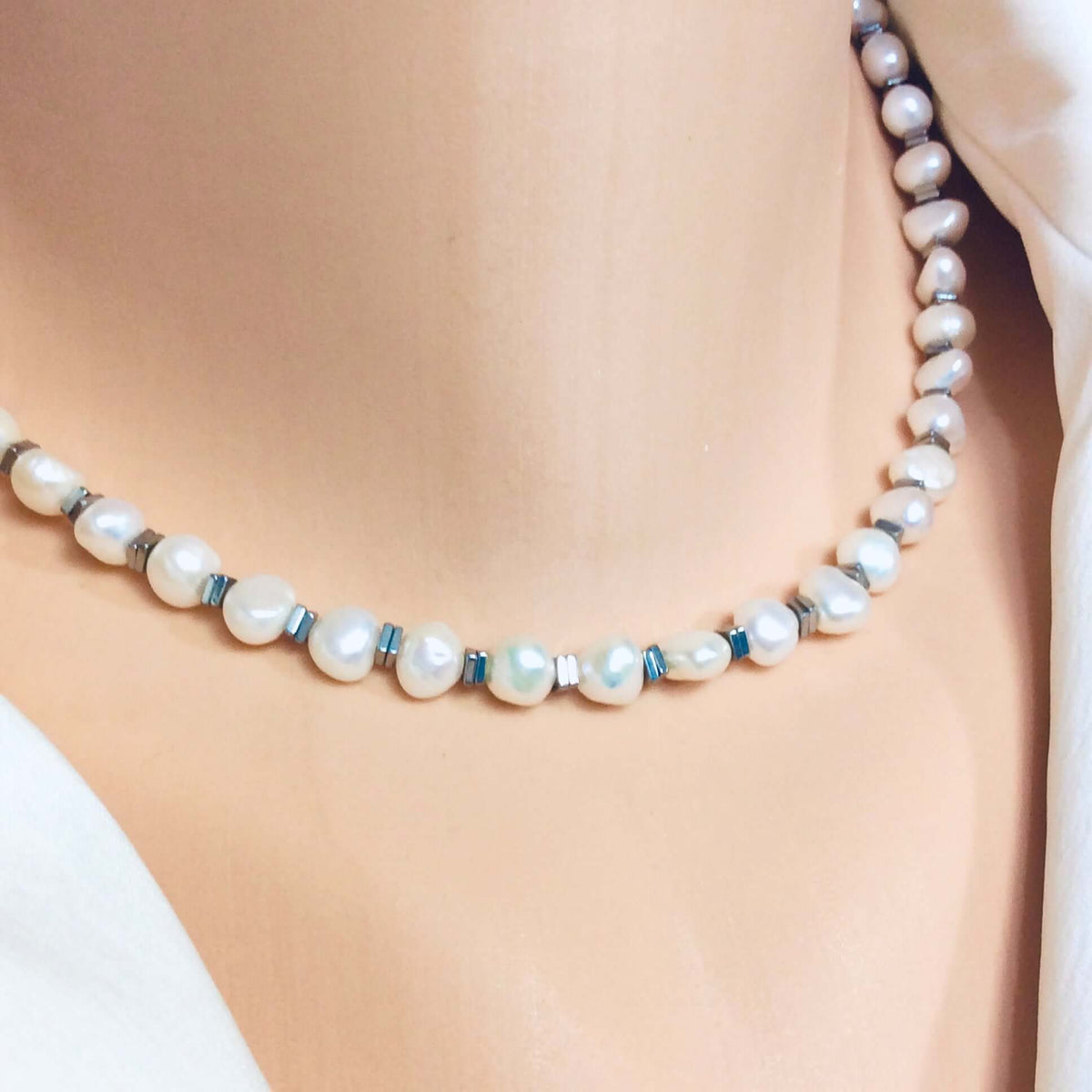 Pearl hematite choker necklace close up showing pearl and hematite bead detail