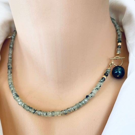 Prehnite tahitian pearl necklace featuring translucent green prehnite beads and black Tahitian pearl