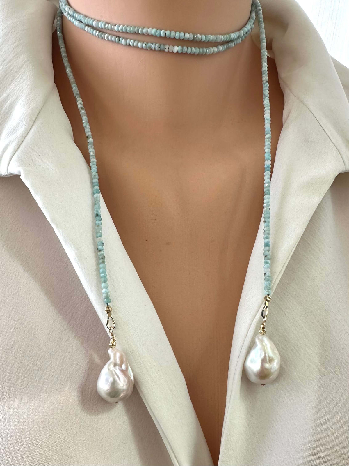 Close-up of Blue Larimar Lariat Necklace on mannequin — detailed view of larimar beads and baroque pearls handcrafted by Loulia Pearl Jewelry