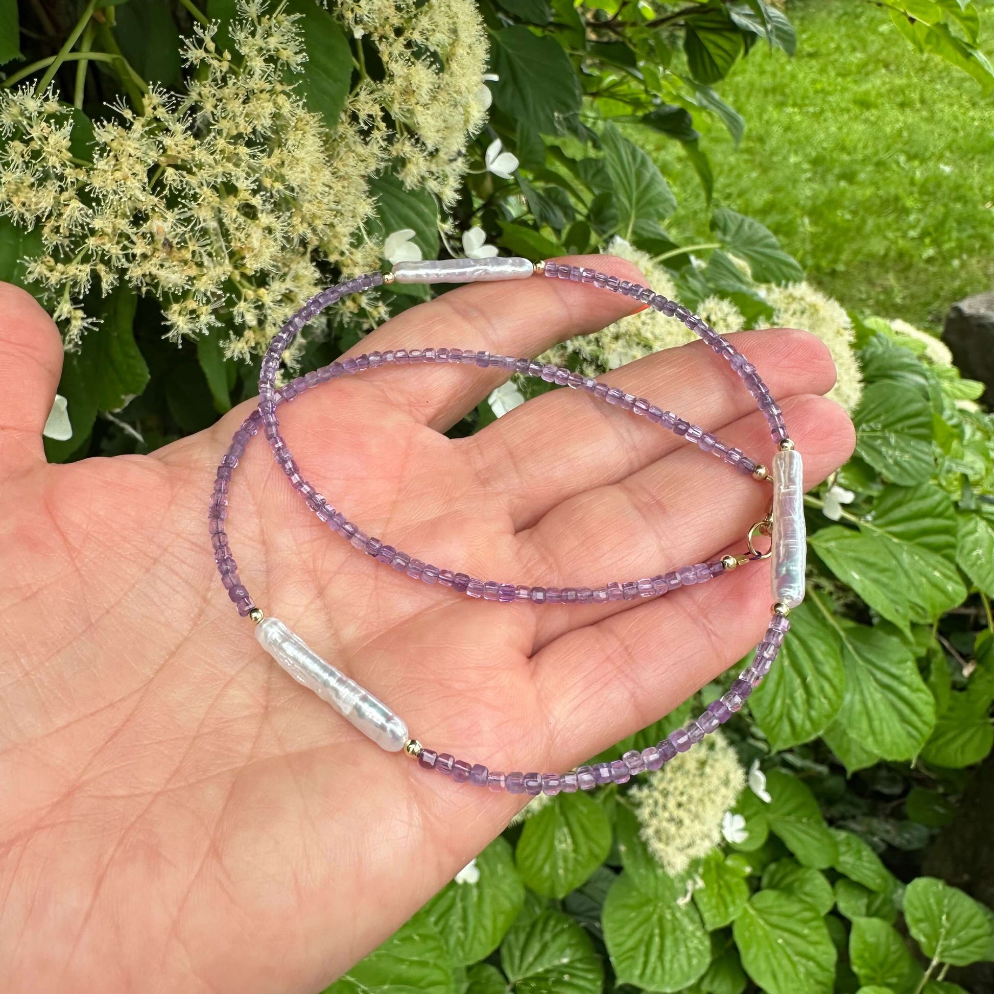 Close-up of Amethyst Pearl Necklace beads and Baroque pearls – natural light