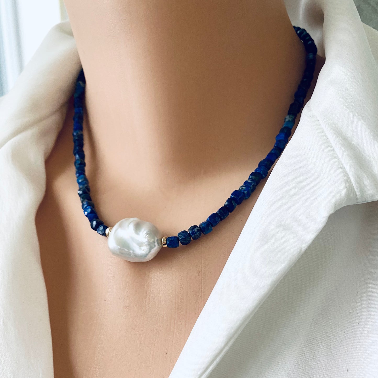 Delicate lapis lazuli baroque pearl necklace featuring minimalist design and freshwater pearl
