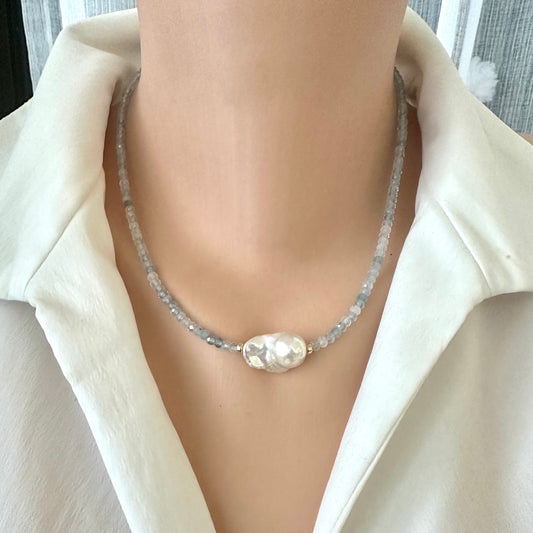 Aquamarine pearl necklace worn on mannequin, close-up front view