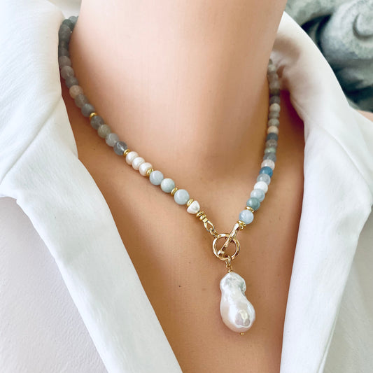 Aquamarine pearl necklace worn on mannequin, front view