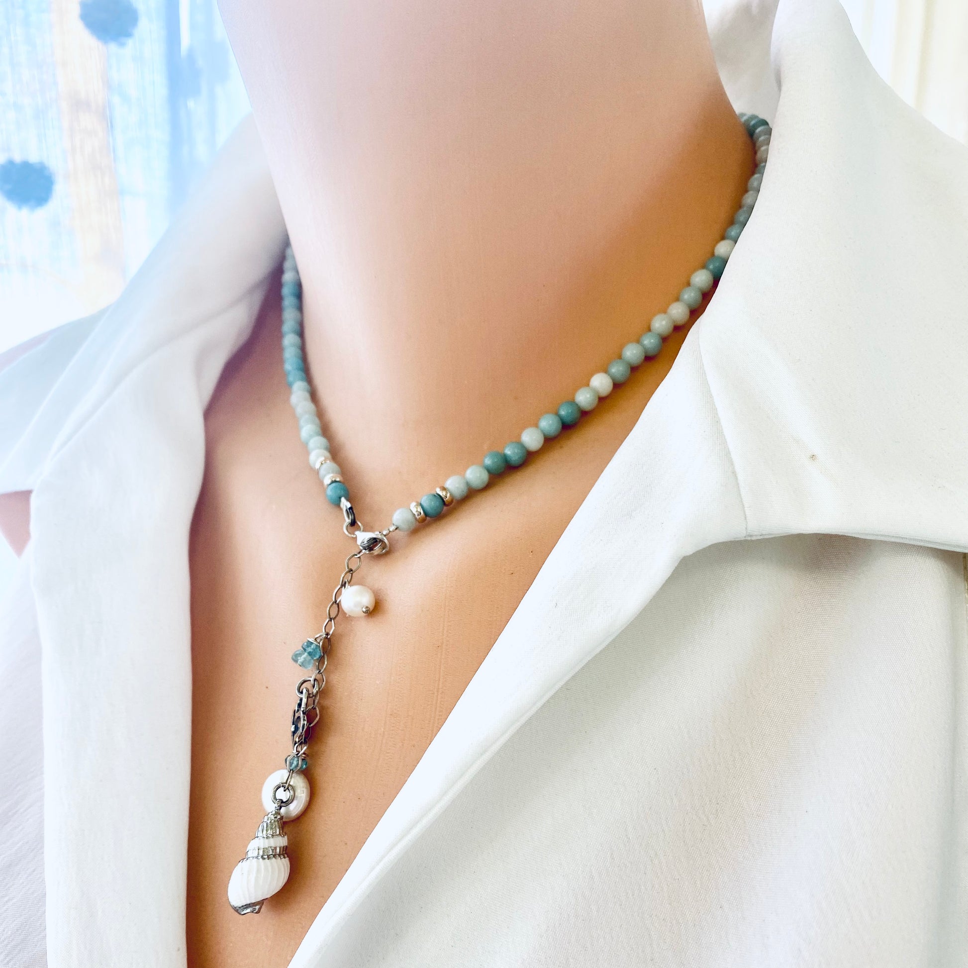 Amazonite pearl necklace worn on mannequin, side view