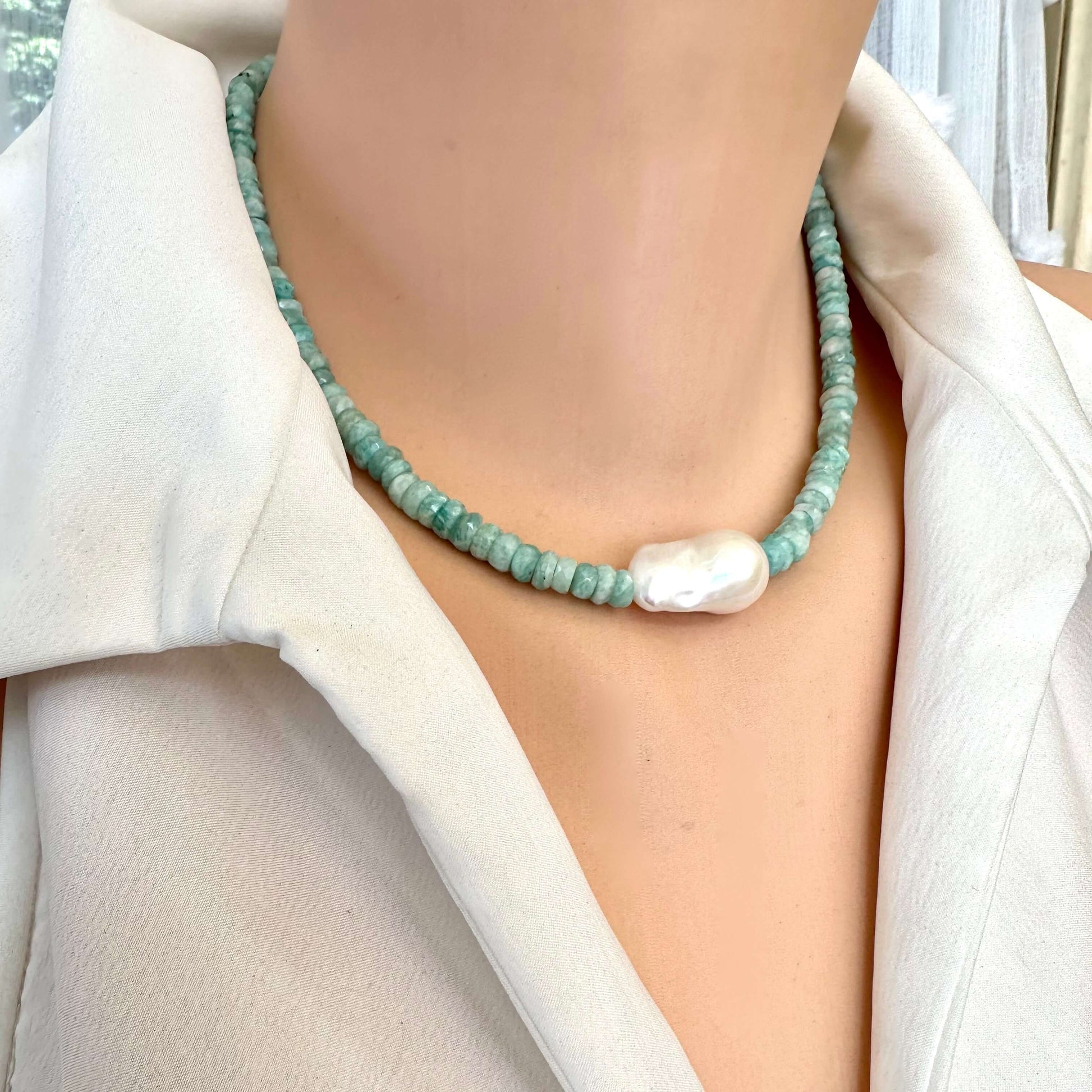 Front view of amazonite and white baroque pearl necklace on mannequin showing sterling silver clasp