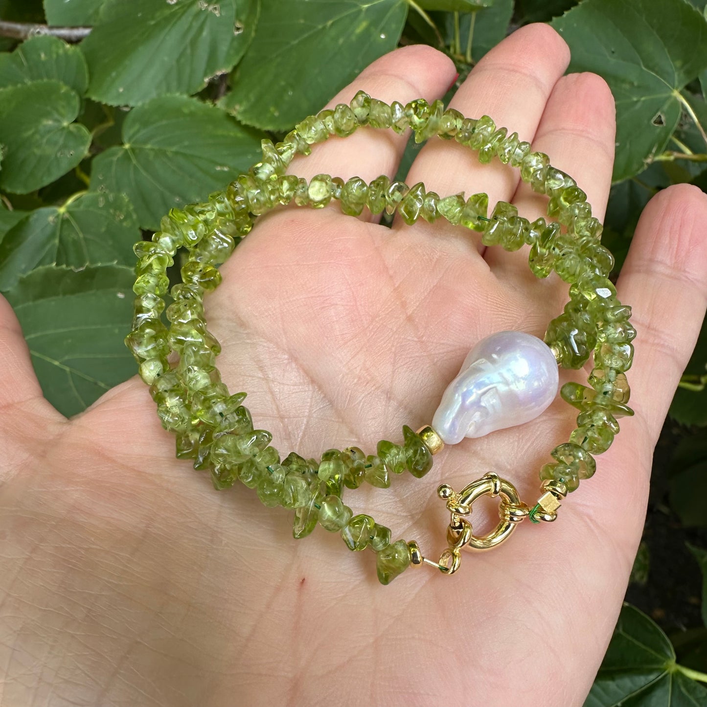 Baroque pearl peridot necklace featuring large freshwater baroque pearl and peridot nuggets