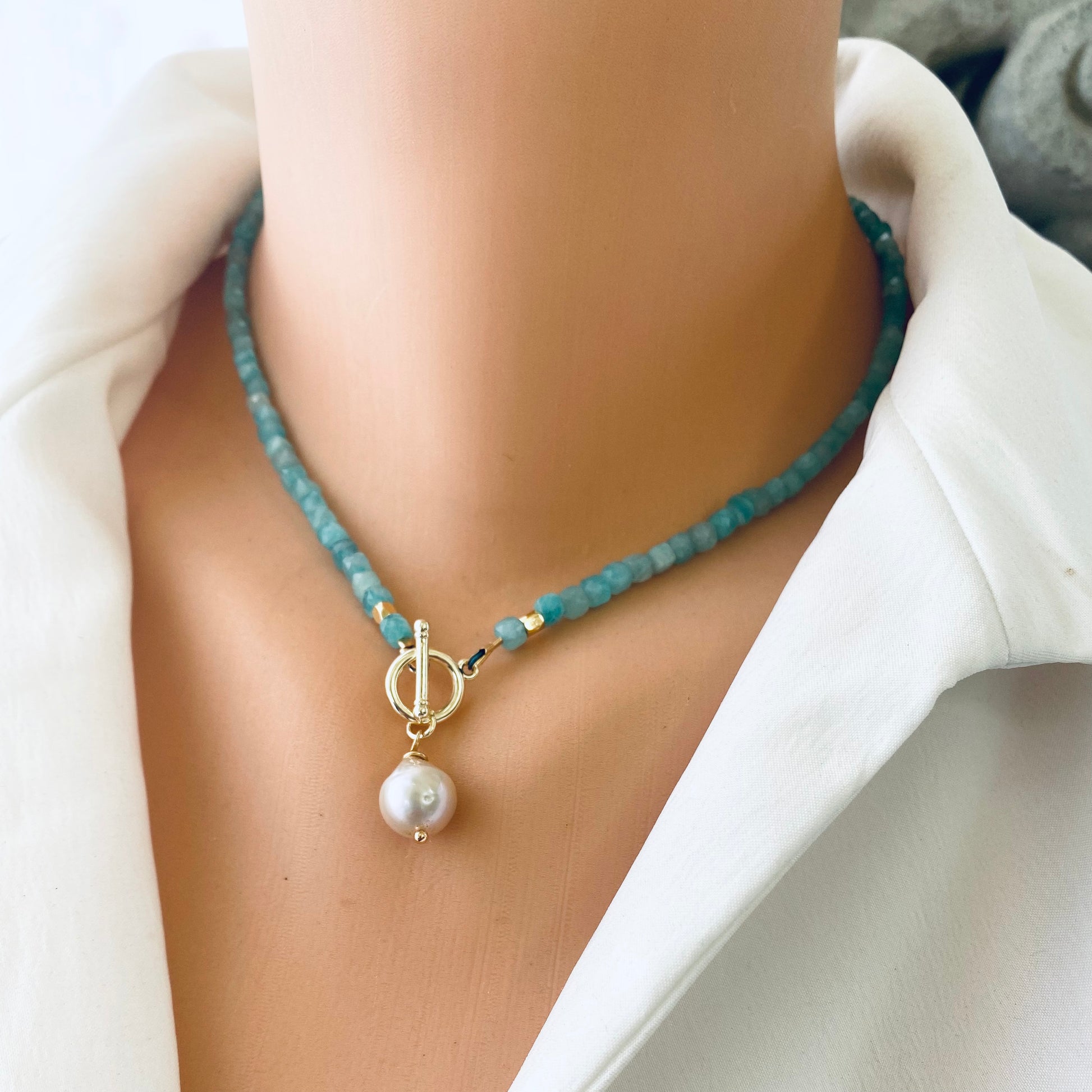 Blue Amazonite Baroque Pearl Necklace | Toggle & Charm Design showcasing delicate aqua-blue gemstones and pearl charm.