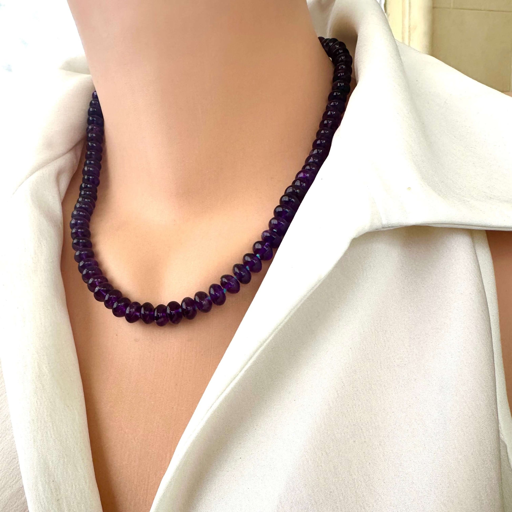 Amethyst beaded necklace worn on mannequin for scale and style reference