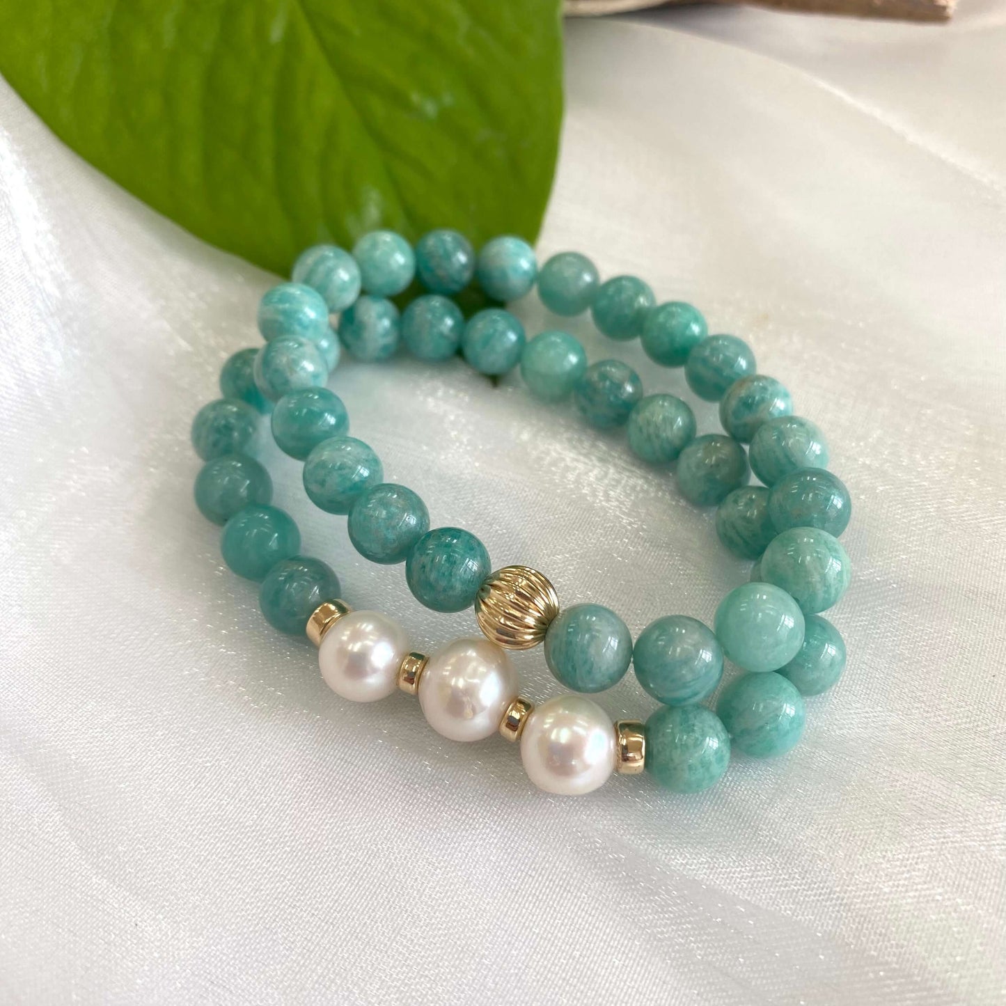 Amazonite freshwater pearl bracelet featuring 8mm Russian Amazonite beads and 9-10mm freshwater pearls in a stretch design.