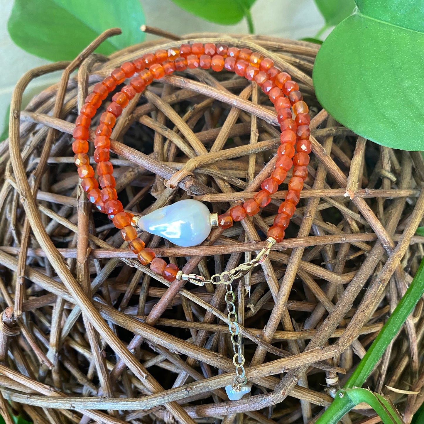 Carnelian pearl necklace featuring burnt orange carnelian cube beads and a beautiful pearl drop pendant.