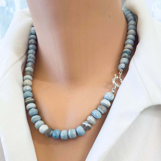 Blue grey opal necklace worn by mannequin, side close-up view highlighting shaded tones