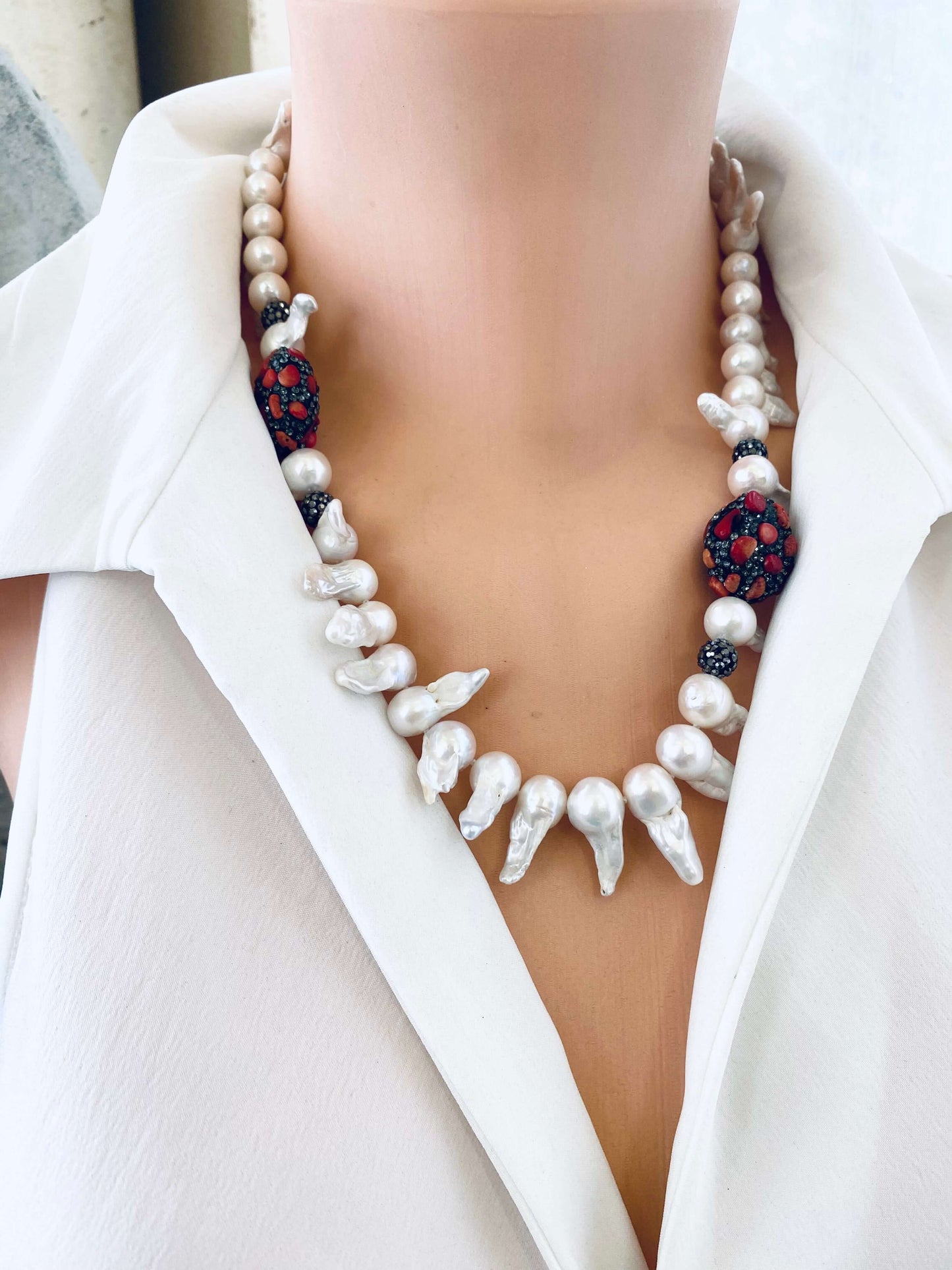 Baroque pearl jellyfish necklace red coral front view on mannequin handmade in Canada