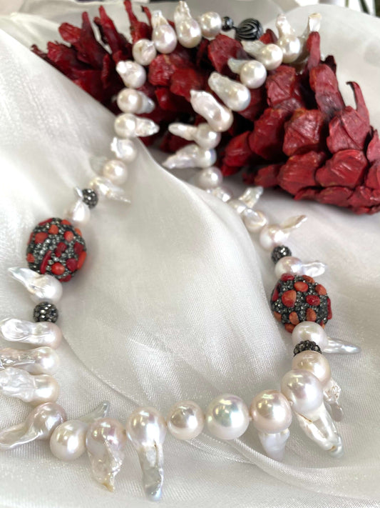 Baroque pearl jellyfish necklace red coral on white cloth with red pine cone handmade in Canada
