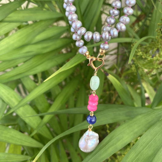 Grey pearl necklace with removable pendant showing baroque pearl with lapis lazuli, chrysoprase, and chalcedony