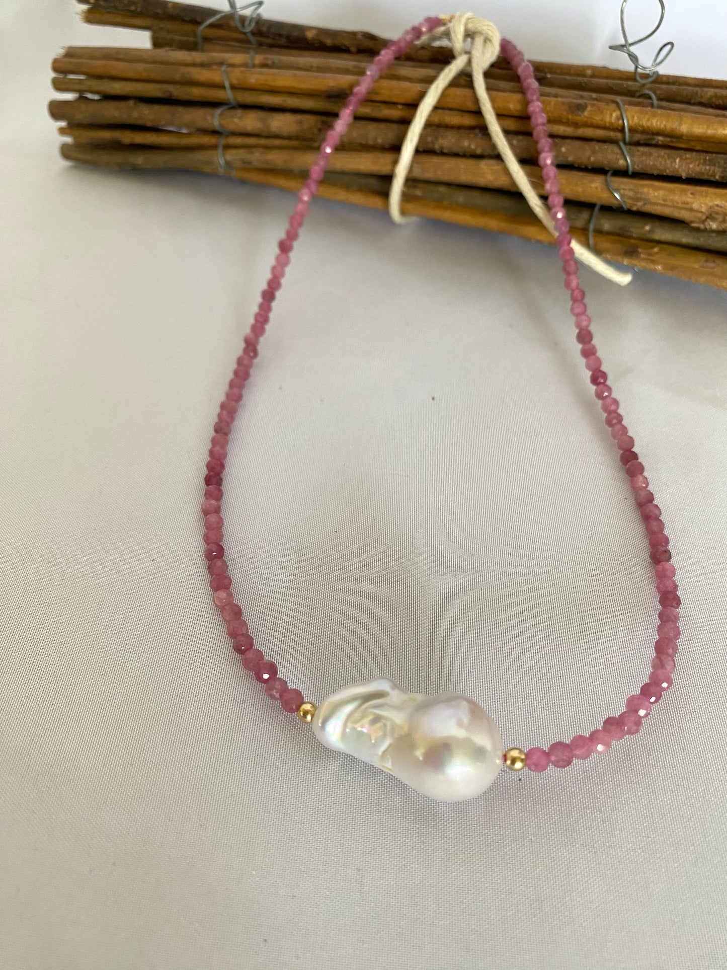 Pink Tourmaline Baroque Pearl Necklace | Handmade in Canada featuring pink tourmaline beads and a large baroque pearl.