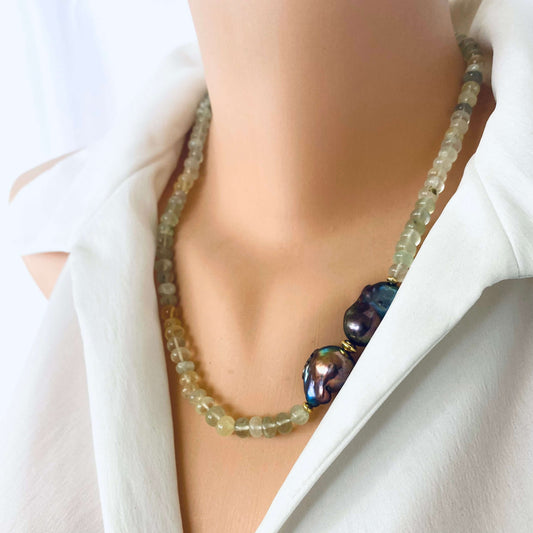 Prehnite and Black Baroque Pearl Necklace displayed on a mannequin, showcasing translucent green beads and striking black pearls.