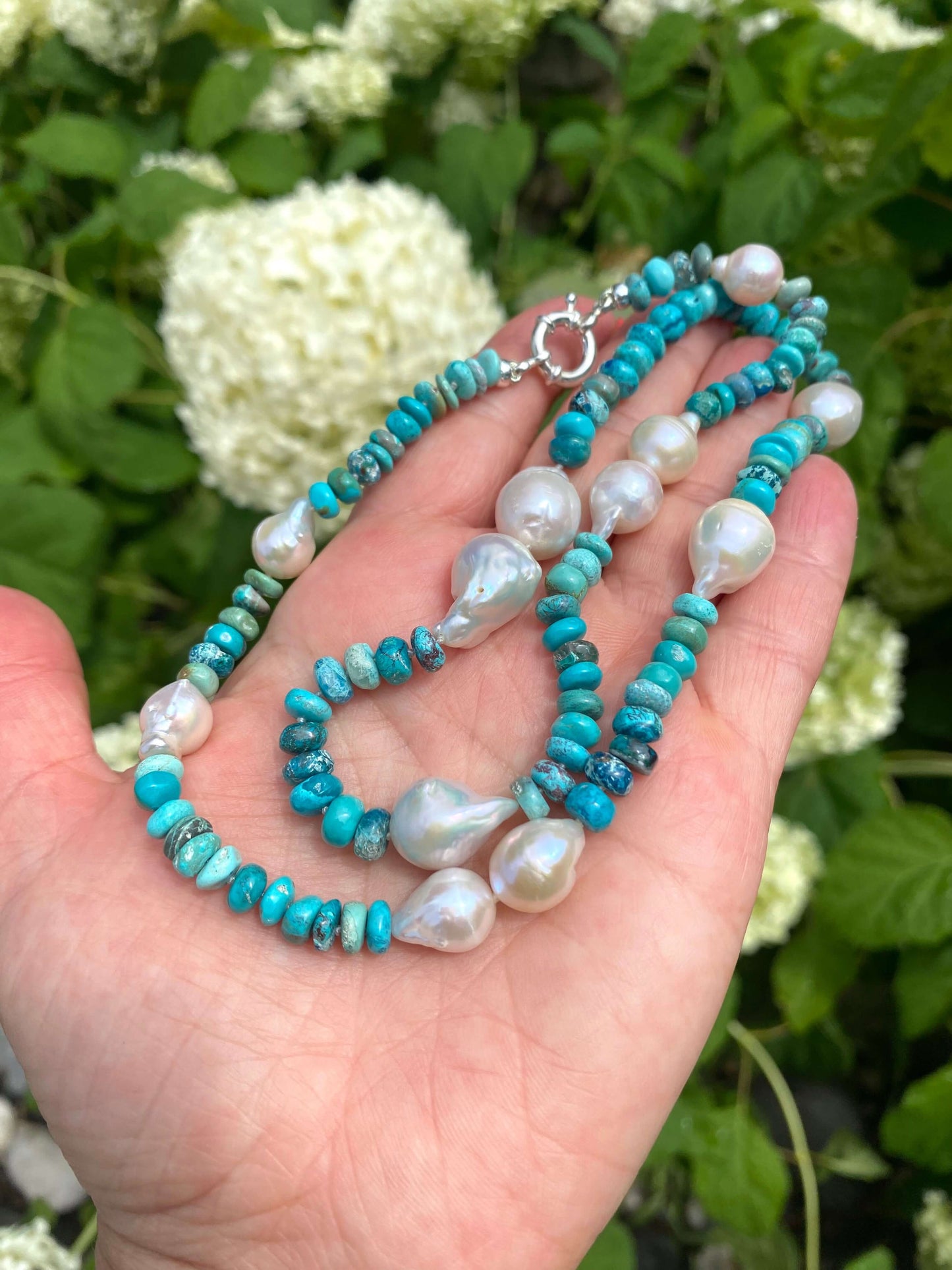 Arizona turquoise pearl necklace showcasing handcrafted baroque design with turquoise and pearl beads.