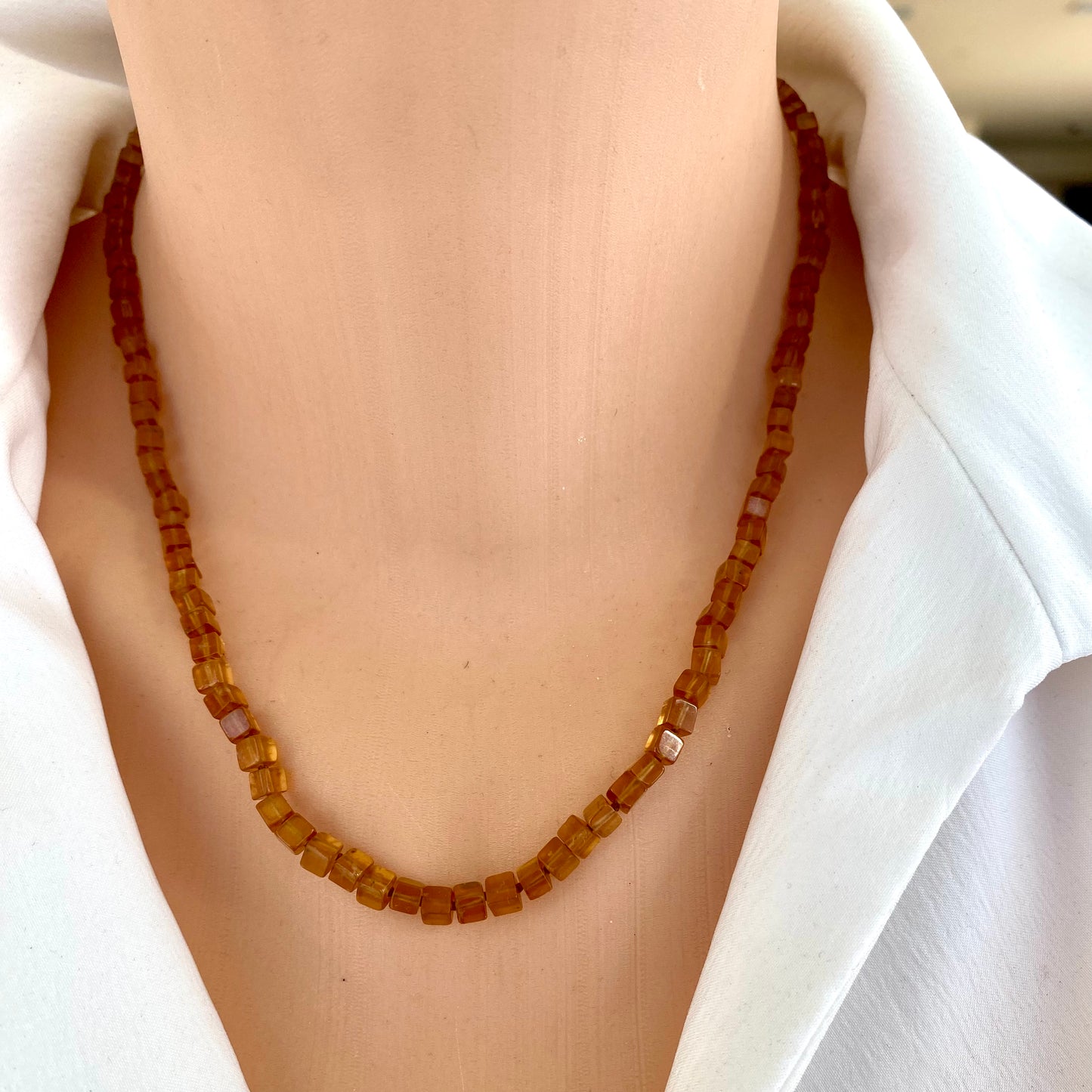 Hessonite garnet necklace featuring handcrafted cube stones in warm golden-yellow to amber tones.