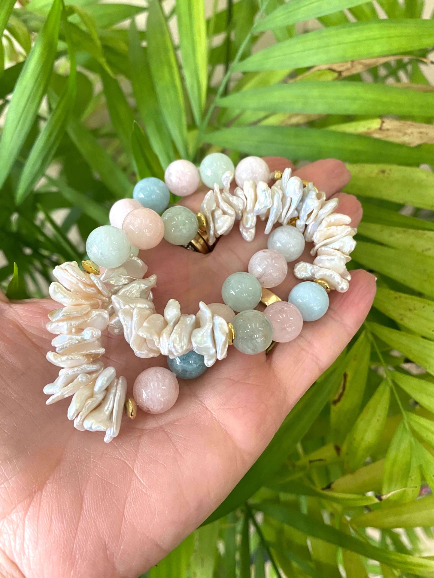 Aquamarine Morganite Necklace – natural gemstones against green leaf background