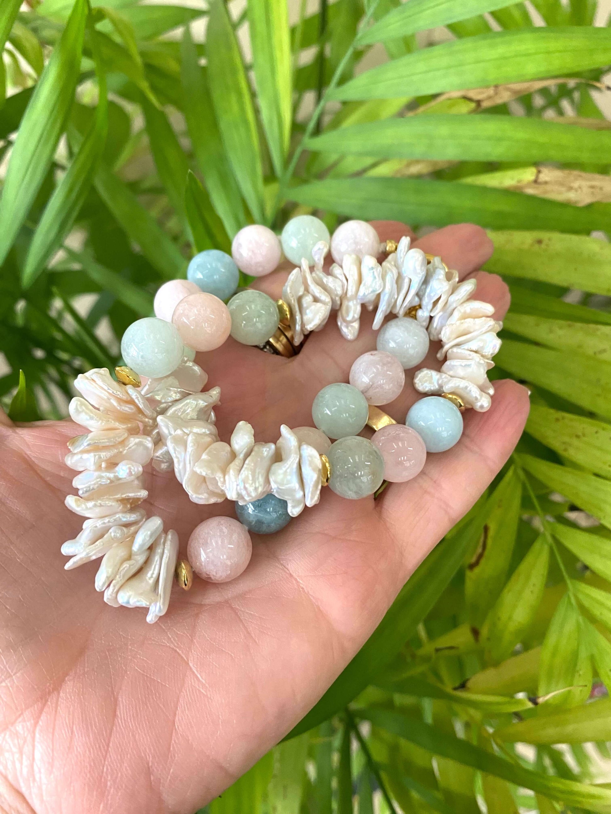 Aquamarine Morganite Necklace – natural gemstones against green leaf background