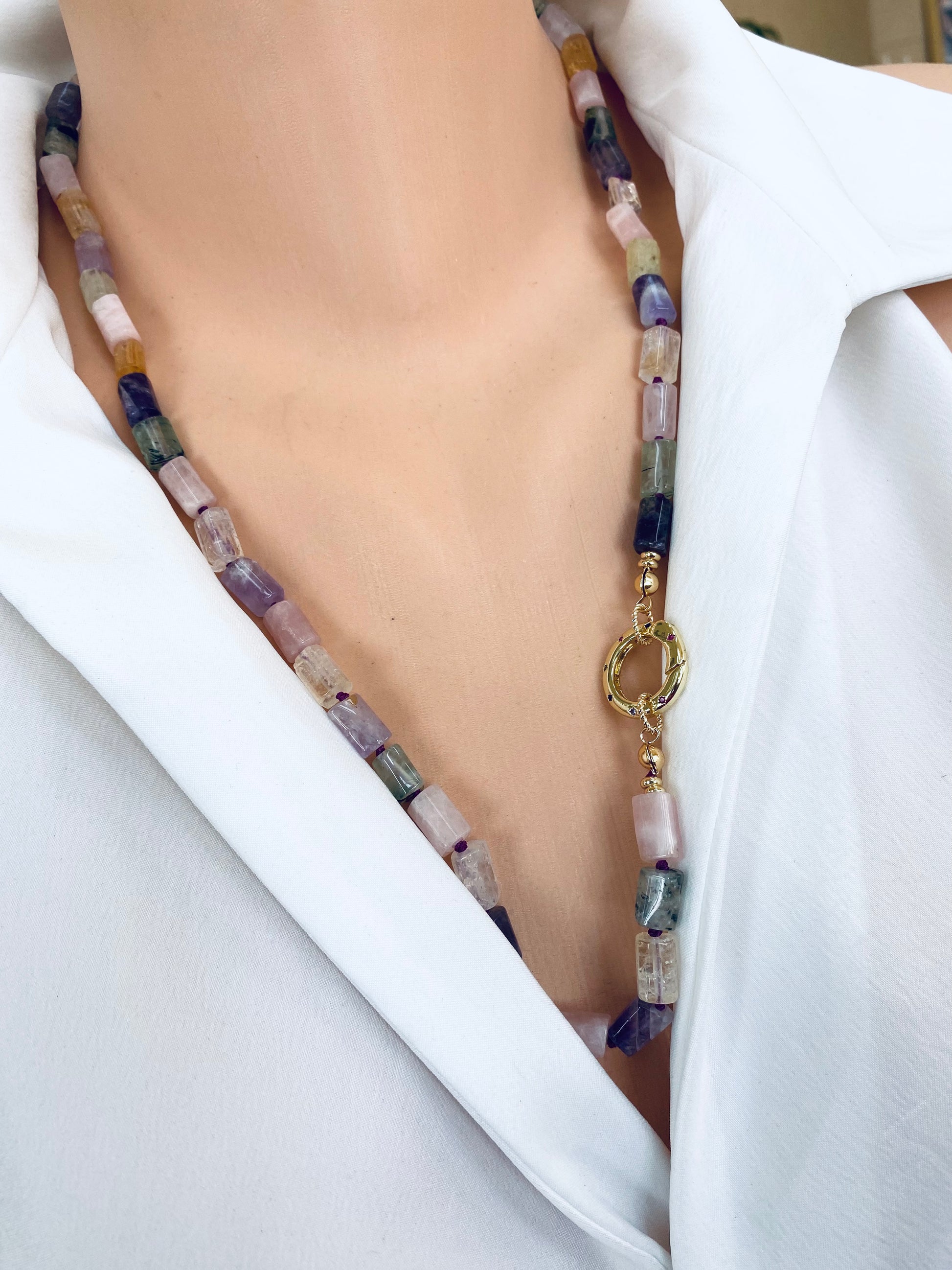 Mixed gemstone necklace close-up on neckline with pastel gemstone beads, handcrafted in Canada