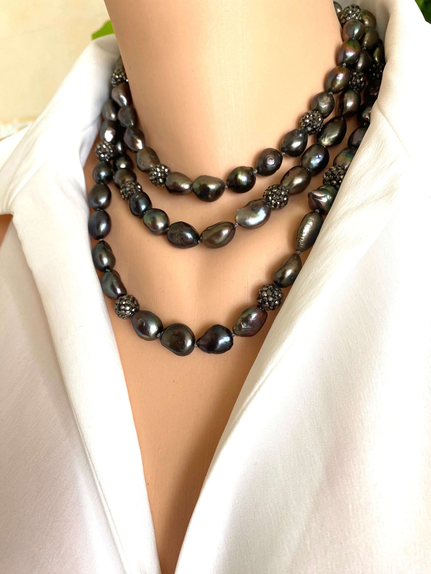 LIVE #40 - Very Long Peacock Pearl Necklace w/ Rhinestone Spacer Beads displayed on a mannequin.