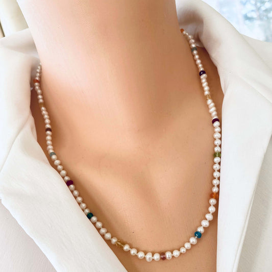 Rainbow gemstone pearl necklace worn at collarbone with delicate freshwater pearls