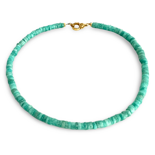 A beaded necklace made of small, chunky turquoise-green beads with a gold clasp, displayed on a clean white background.