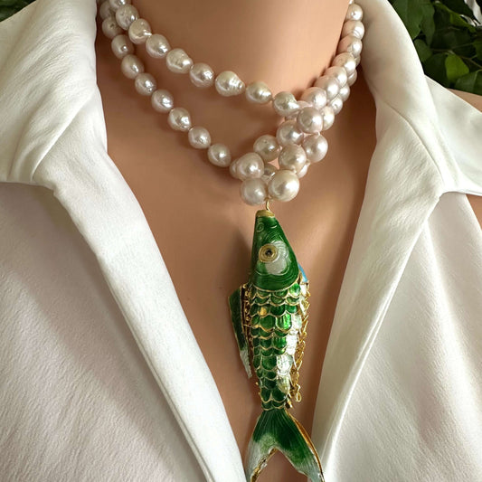 Cloisonné fish pearl necklace featuring green fish pendant and hand knotted baroque pearls on a mannequin.