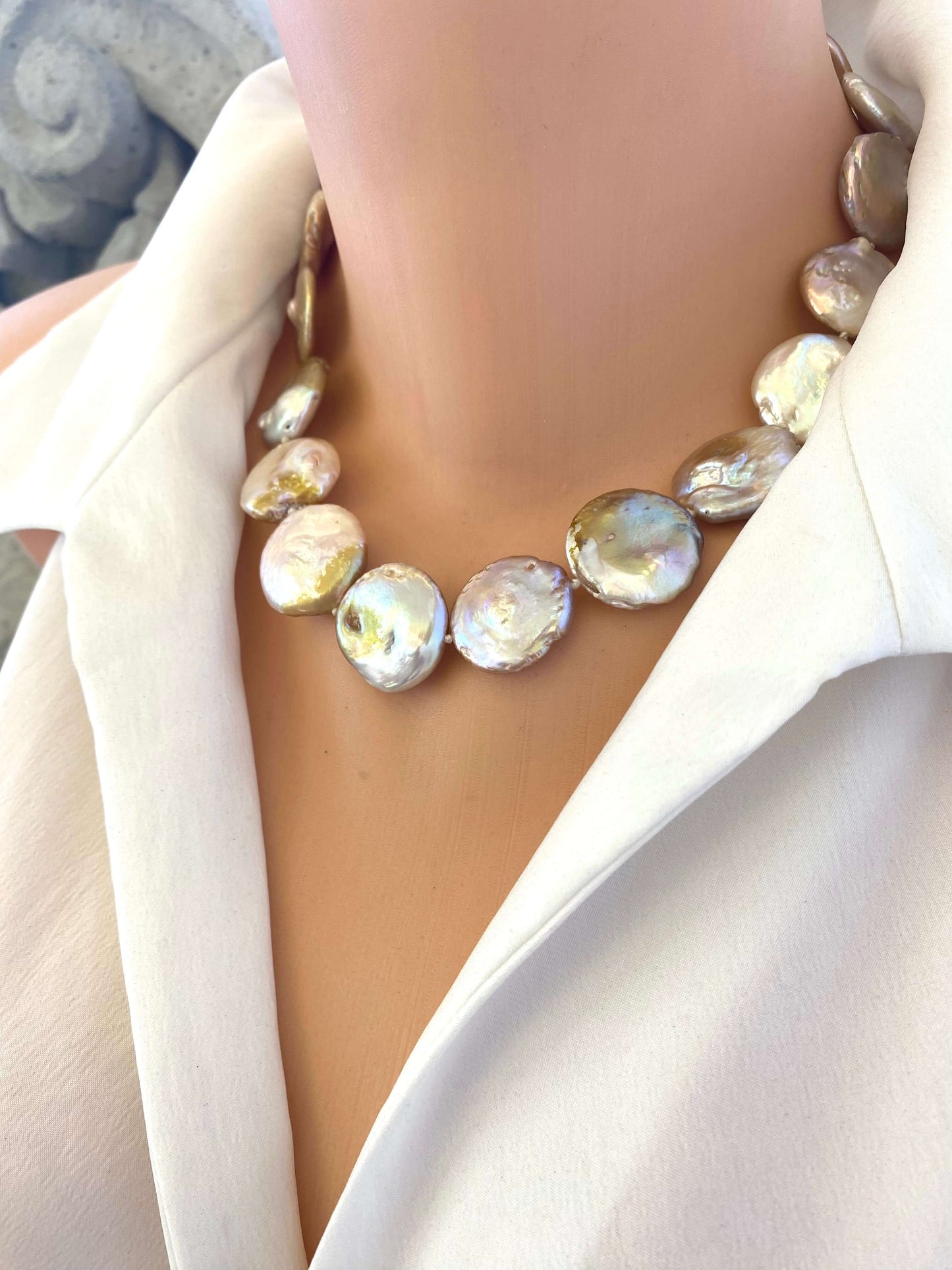 Large coin pearl necklace angled display on mannequin, lustrous pearls