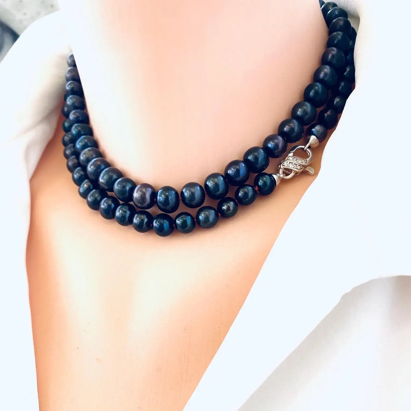 Peacock navy blue pearl necklace long doubled as choker on mannequin handmade in Canada
