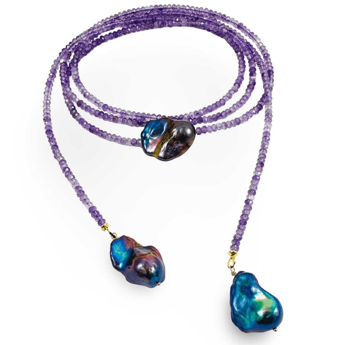 A long strand beaded necklace featuring purple amethyst beads and two large, baroque-shaped iridescent pearl pendants with gold-tone accents, displayed on a clean white background.