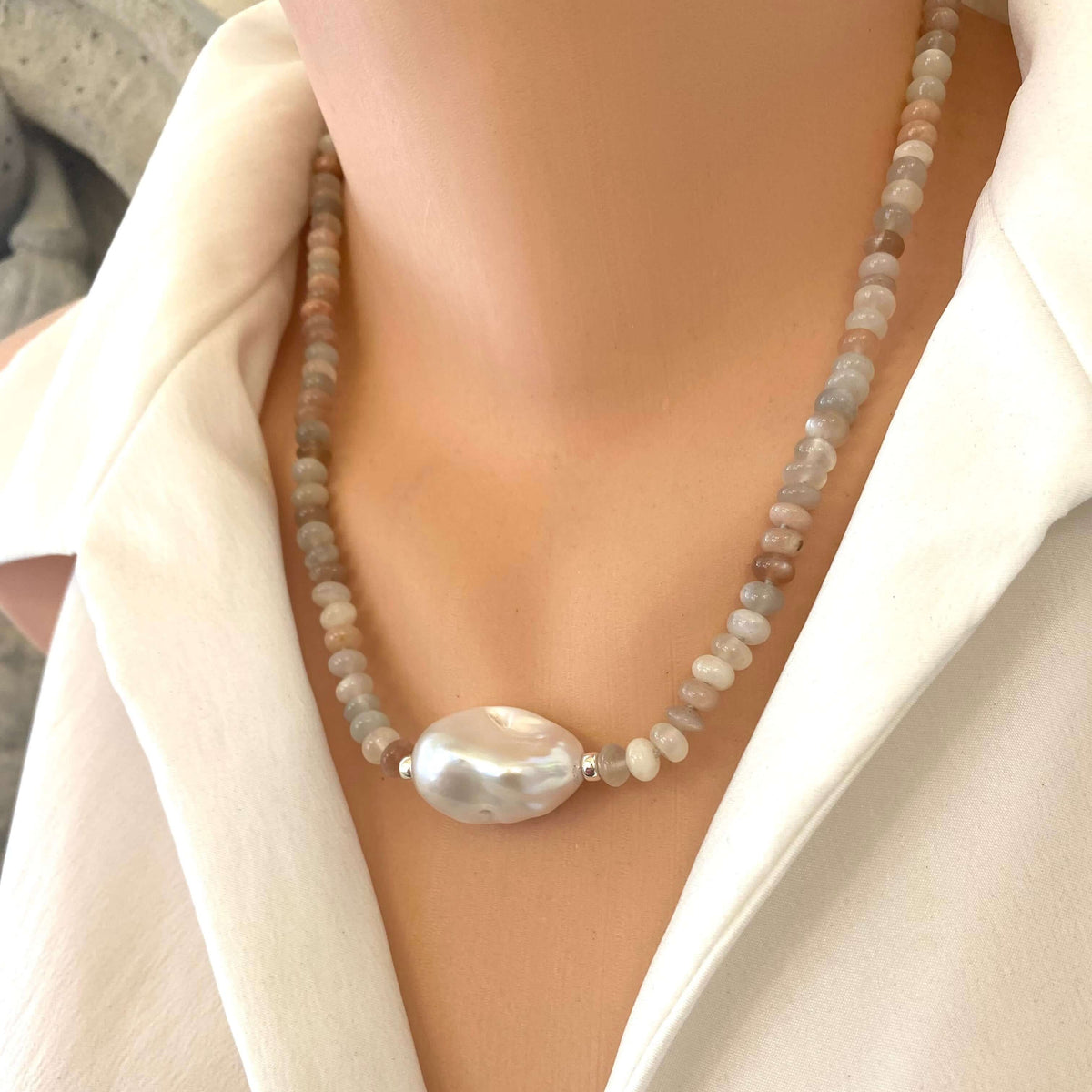 Moonstone and Baroque Pearl Necklace showcasing mixed moonstone rondelles and a baroque pearl center.