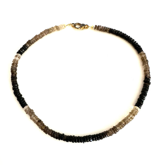 shaded smoky quartz beaded necklace on white background
