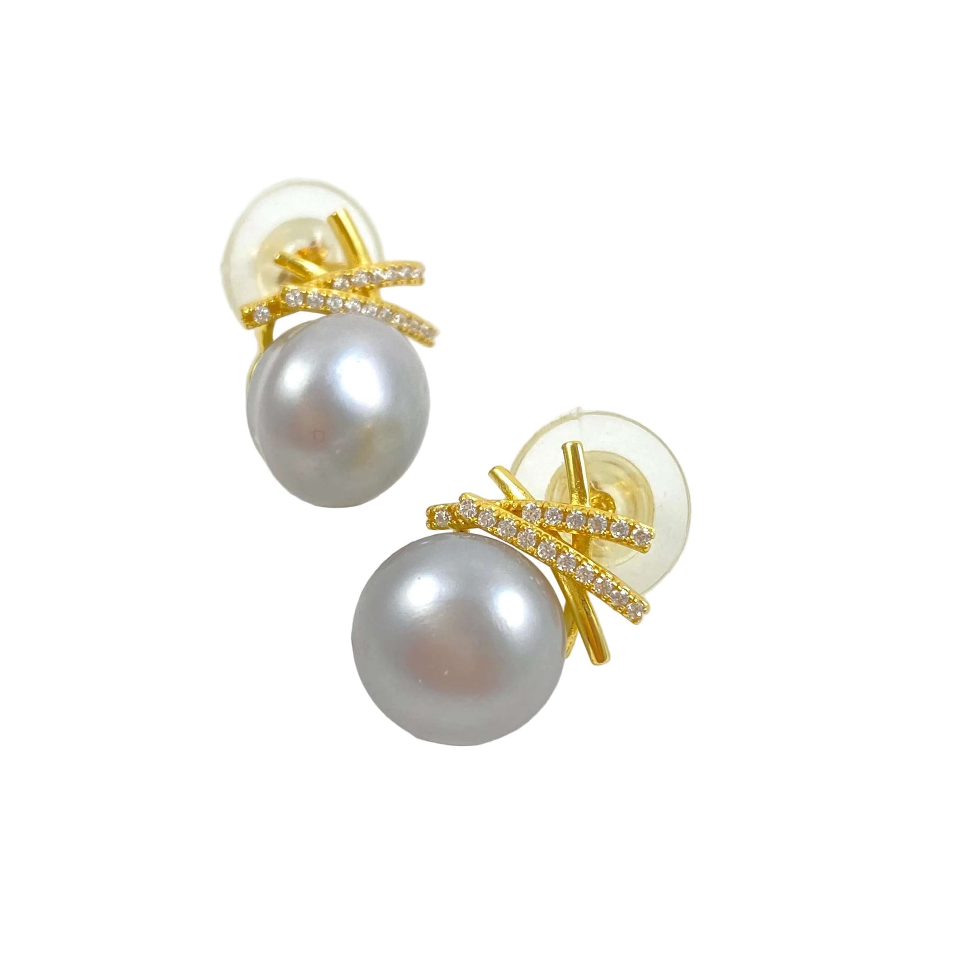 A pair of gold stud earrings featuring a large gray pearl and a gold bow-shaped setting accented with small clear crystals, shown on a white background.