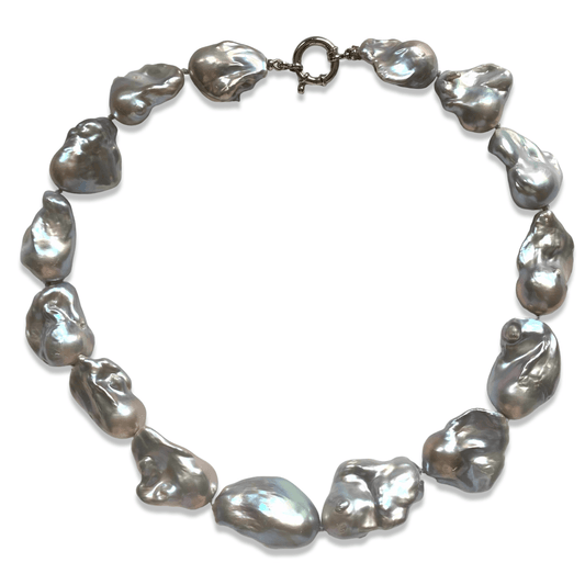 Baroque pearl necklace with silver details, showcasing large, iridescent baroque pearls in an organic design.