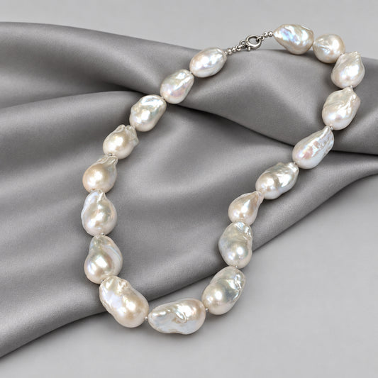 Baroque Pearl Chunky Necklace showcasing unique white freshwater pearls handcrafted on grey silk.