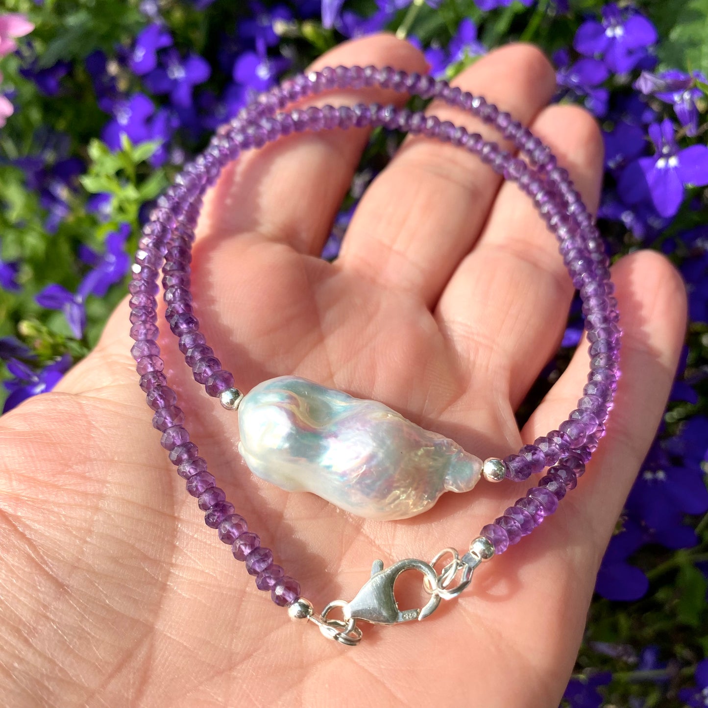 Amethyst baroque pearl necklace with faceted purple amethyst beads and large freshwater pearl