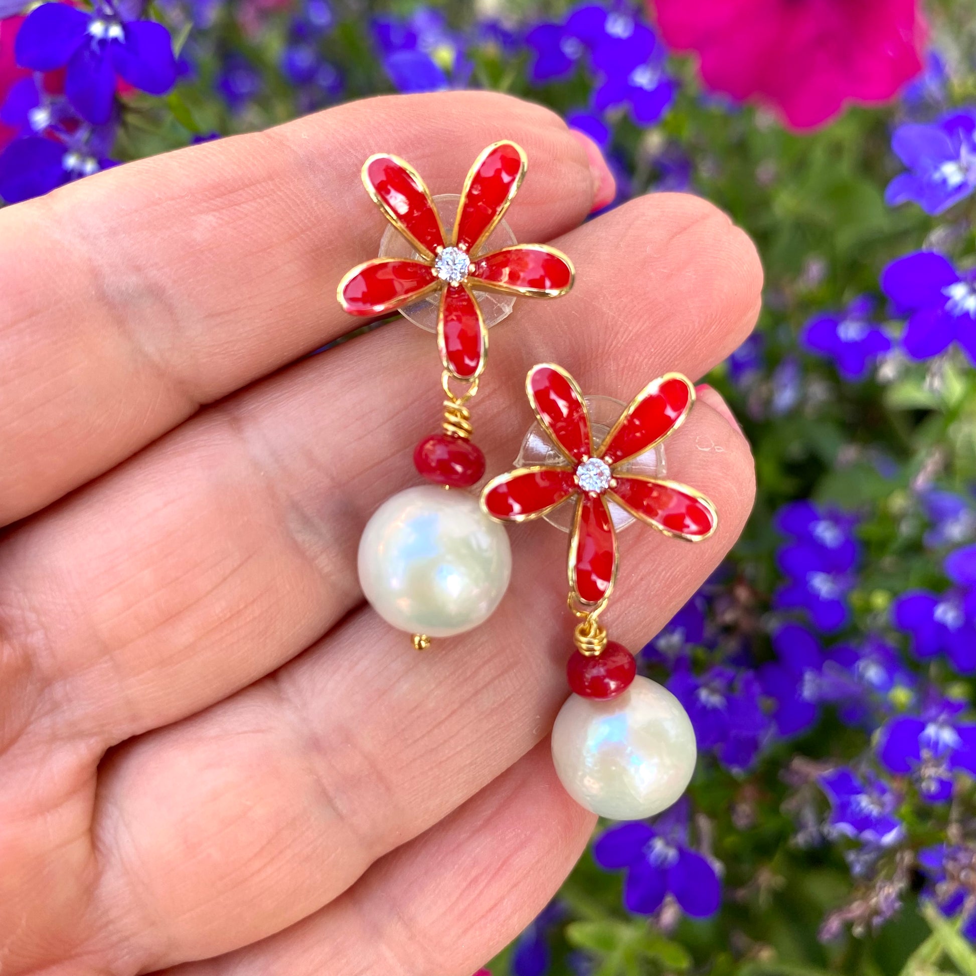 Edison pearl coral earrings with white Edison pearls, coral beads, and red enamel flower studs