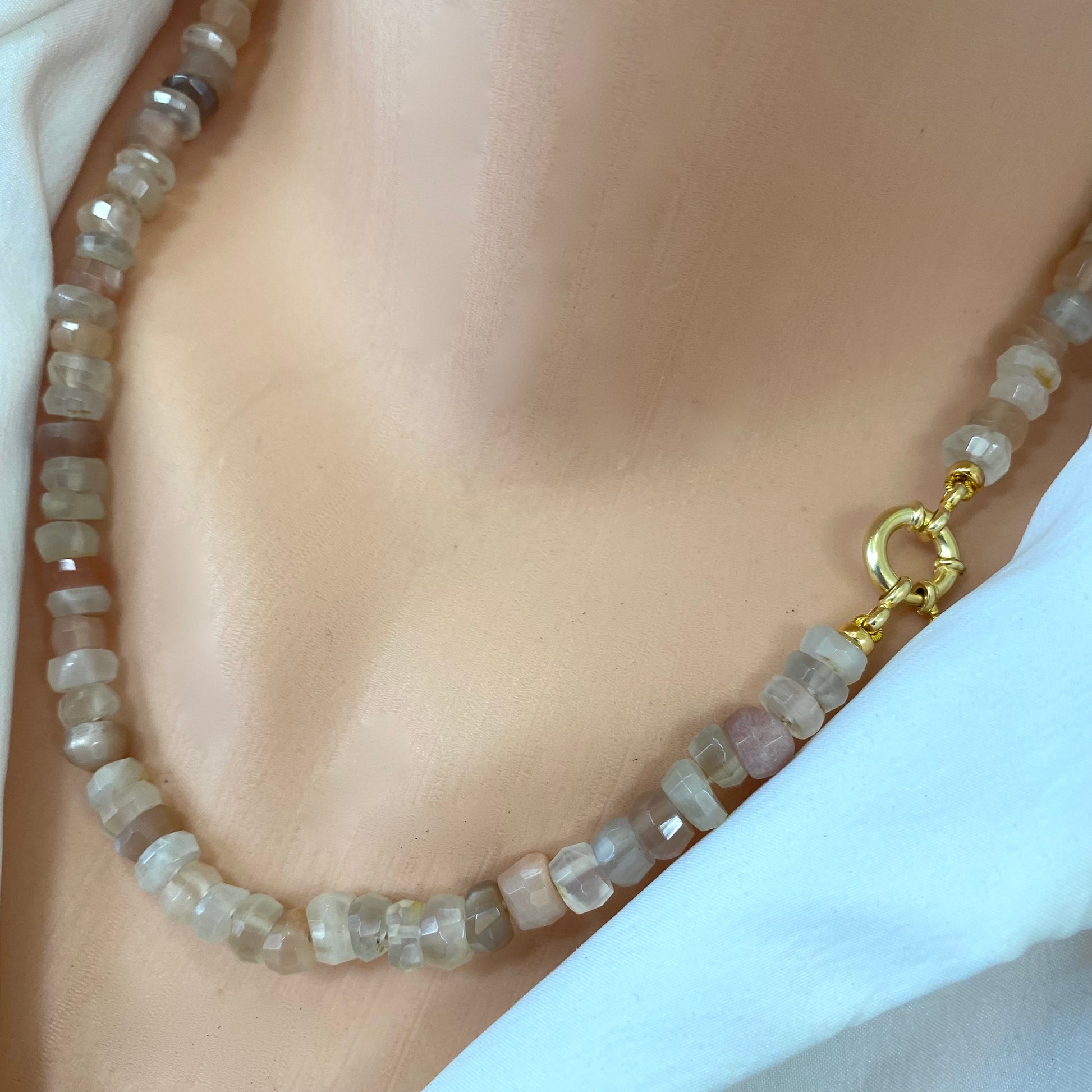 Moonstone candy necklace close-up showing faceted mixed moonstone texture