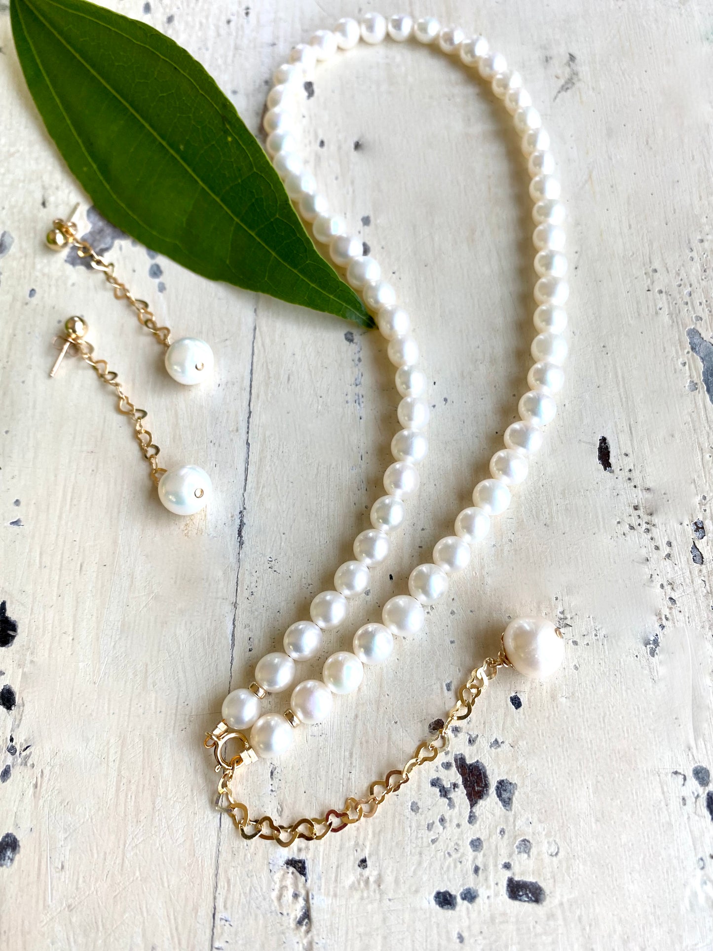 Pearl heart drop earrings styled with matching pearl heart necklace and gold filled chain