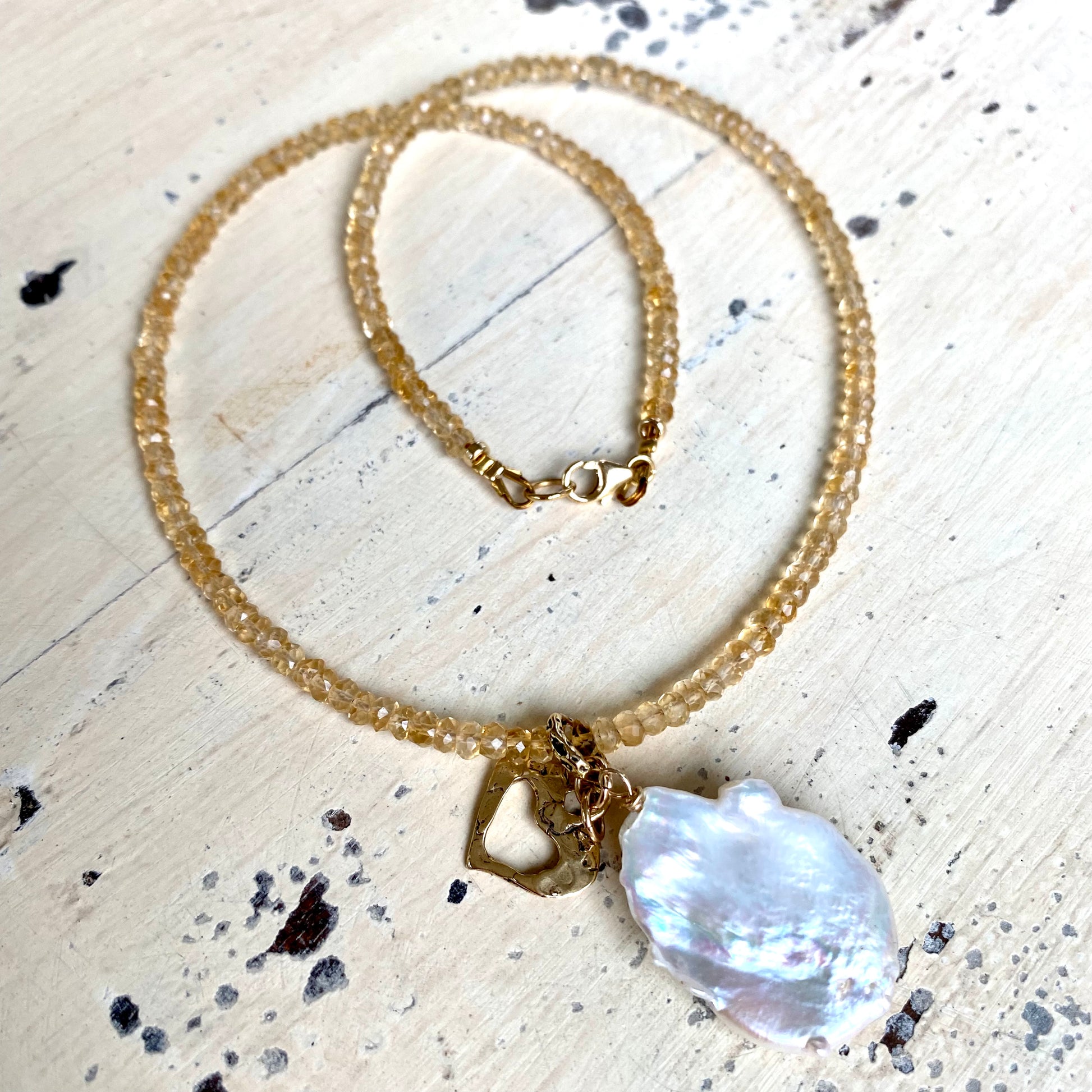Citrine pearl necklace with artisanal gold bronze heart charm and large freshwater baroque pearl