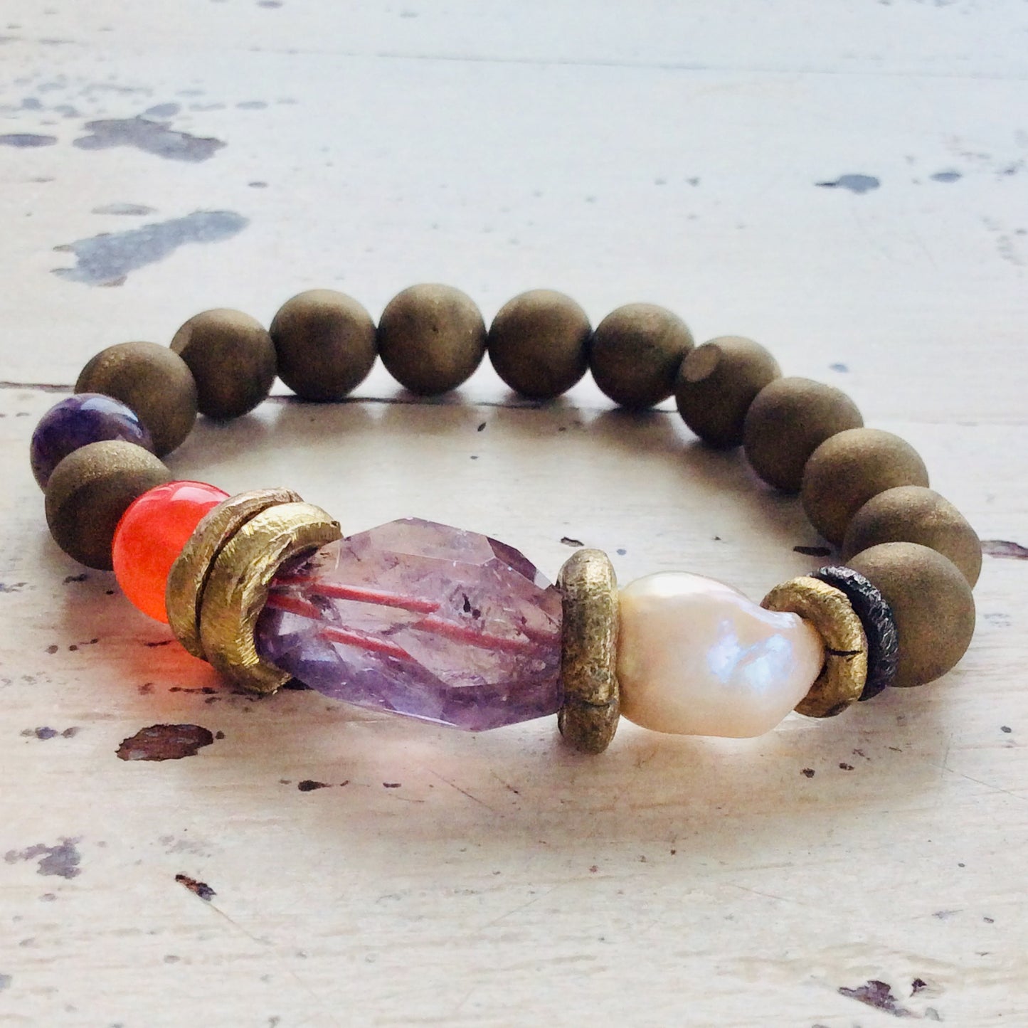 Amethyst baroque pearl bracelet showcasing handcrafted bead arrangement and organic textures